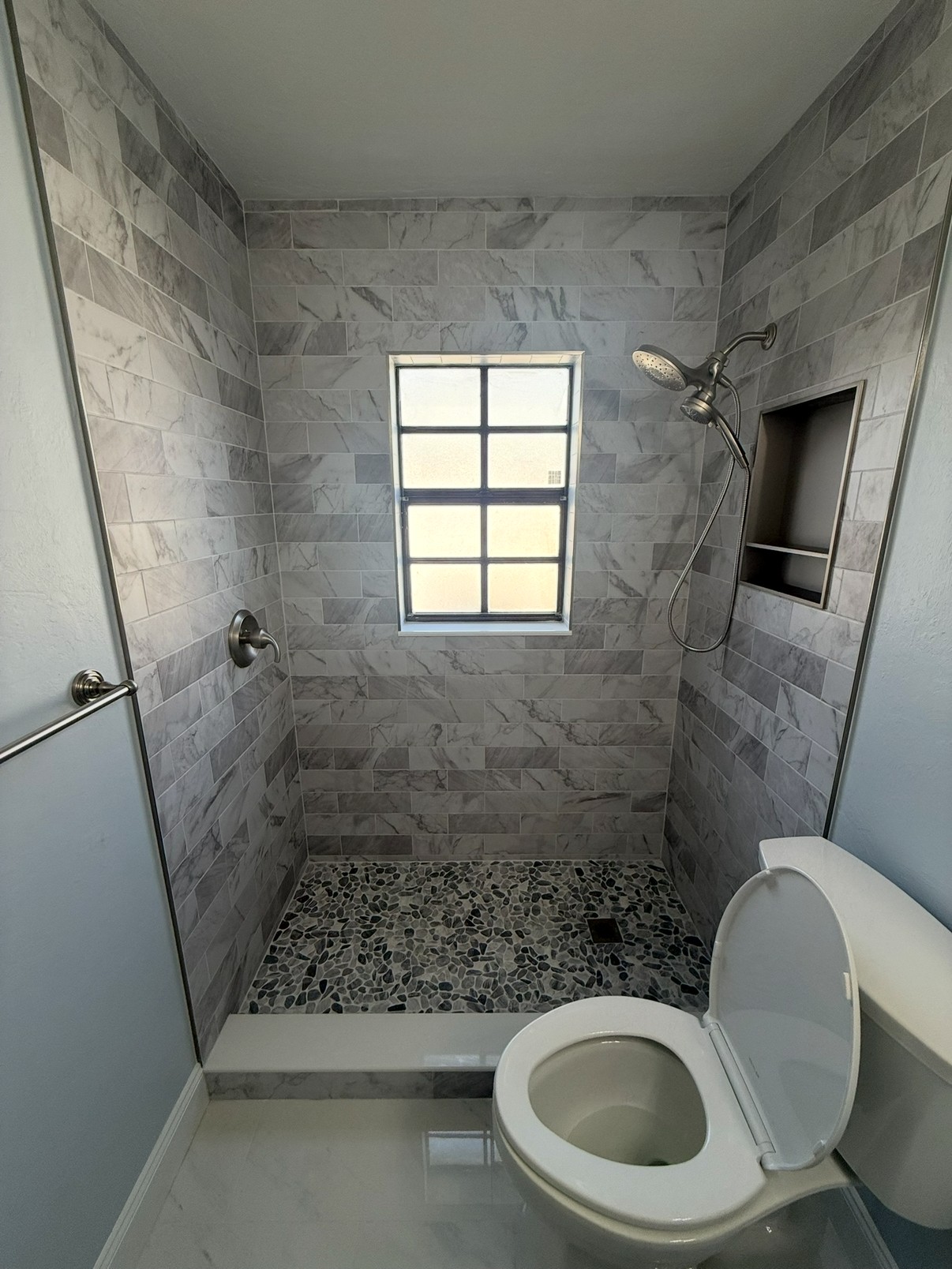 Finished walk-in shower from a tub-to-shower conversion by Verano