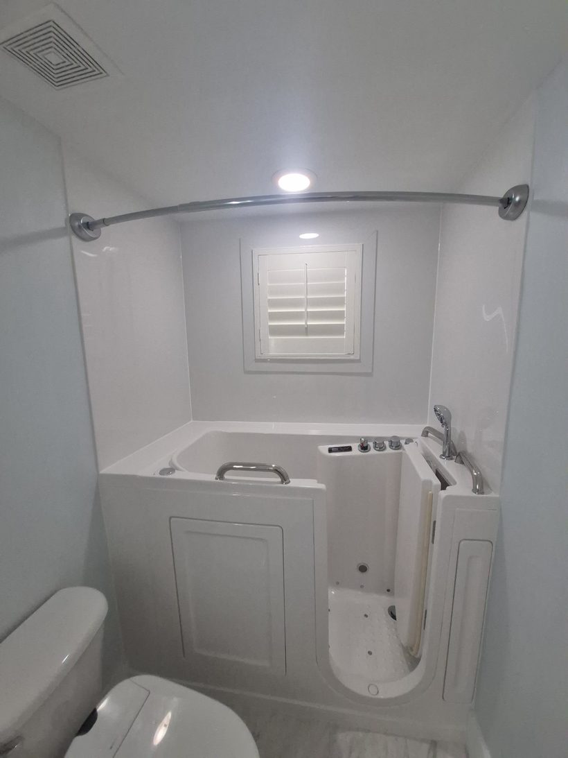 Walk-in tub and barrier-free shower installation for aging in place